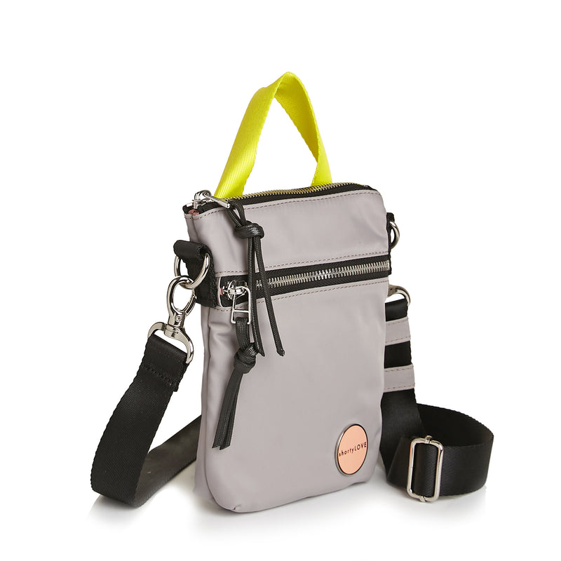 shortyLOVE shorthand small crossbody bag in greyr; side angle view against white background.