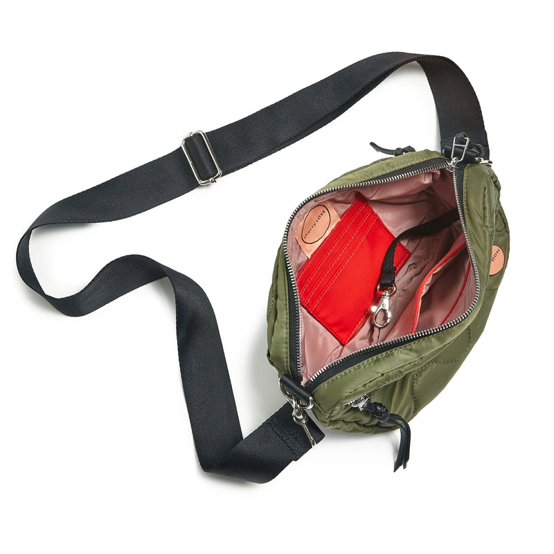 shortyLOVE small cruiser small crossbody bag in sage; top-down view showing interior blush lining against white background.