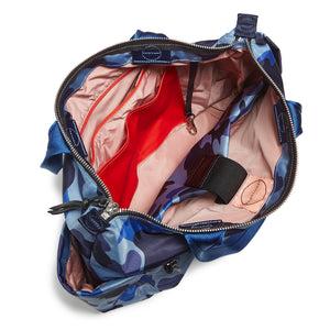 shortyLOVE tillie tote bag in blue camo; top-down view showing interior blush lining against white background.