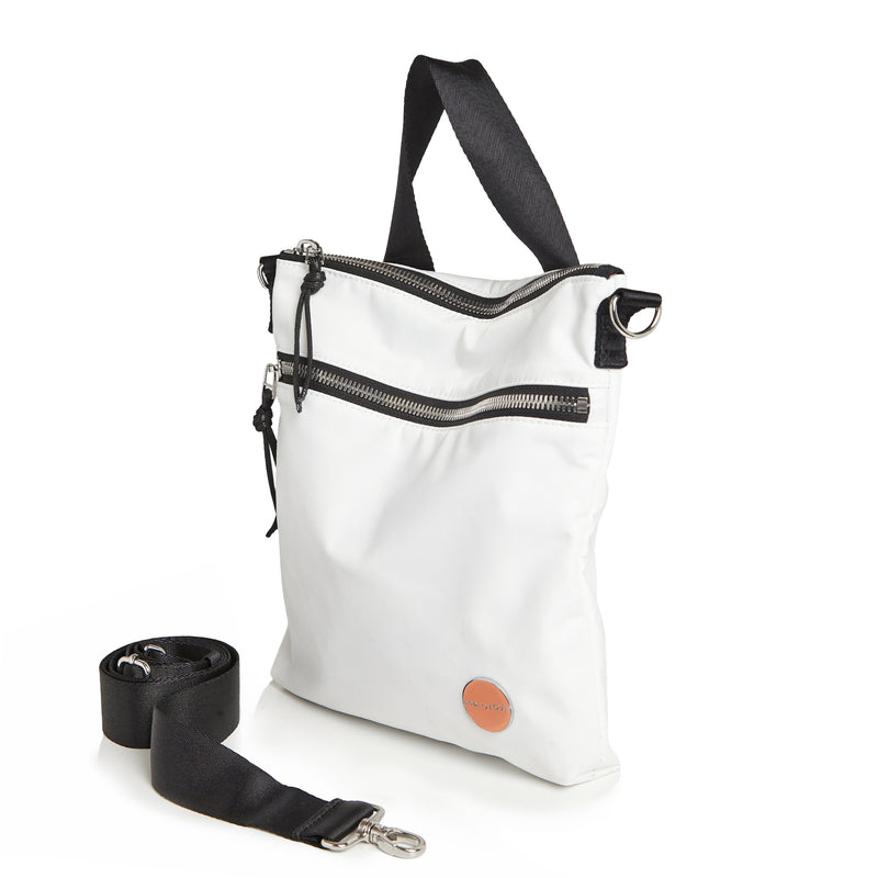 shortyLOVE amuse medium sized crossbody bag in white; side angle view against white background.