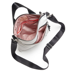 shortyLOVE amuse medium sized crossbody bag in white; top-down view showing interior blush/red lining against white background.