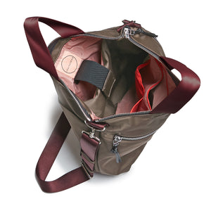 shortyLOVE wonder large crossbody/messenger bag in mocha; top-down view showing interior mocha lining against white background.