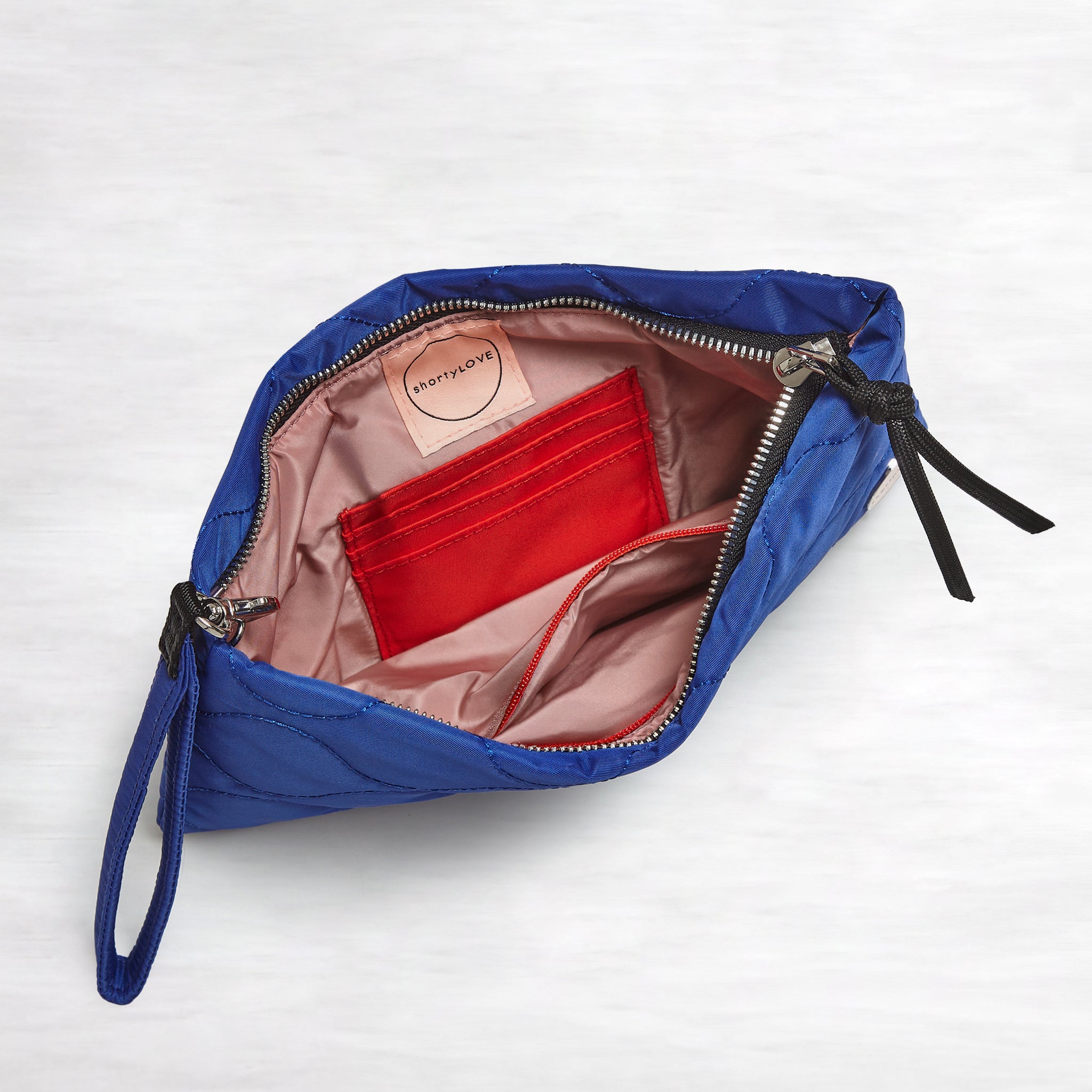 cleo - quilted wristlet clutch