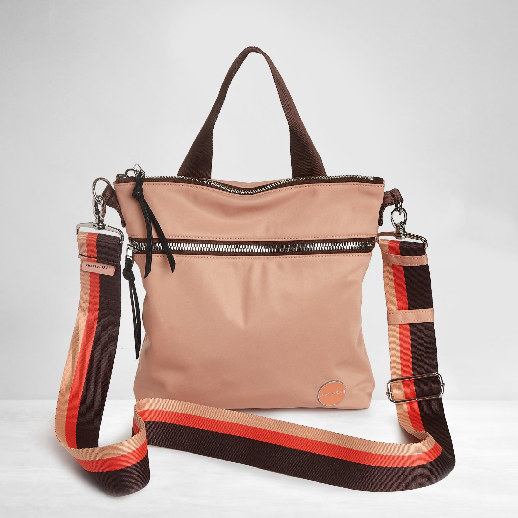 shortyLOVE boardwalk strap in chocolate/peach/coral; shown with amuse bag in dusty peach.