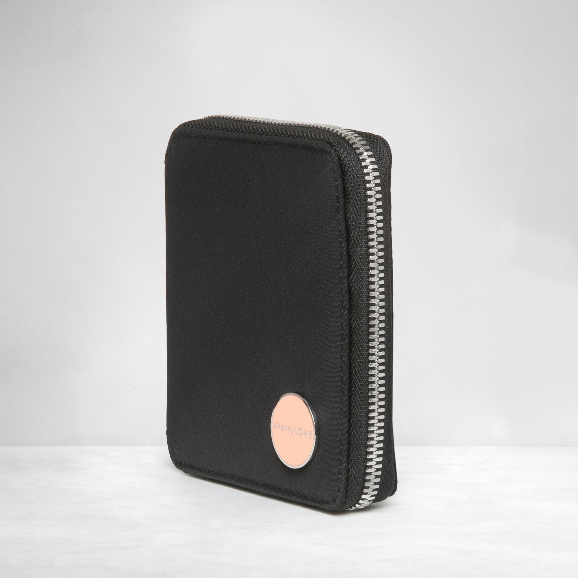 shortyLOVE merchant small wallet in black; side angle view against white background.