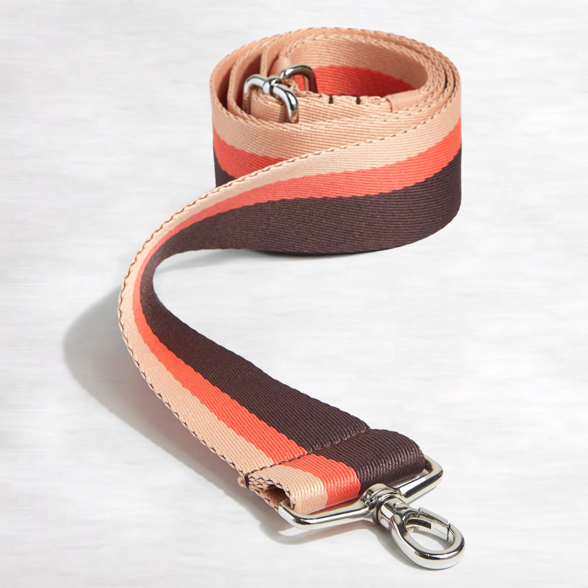 shortyLOVE boardwalk strap in chocolate/peach/coral; front view rolled against white background.