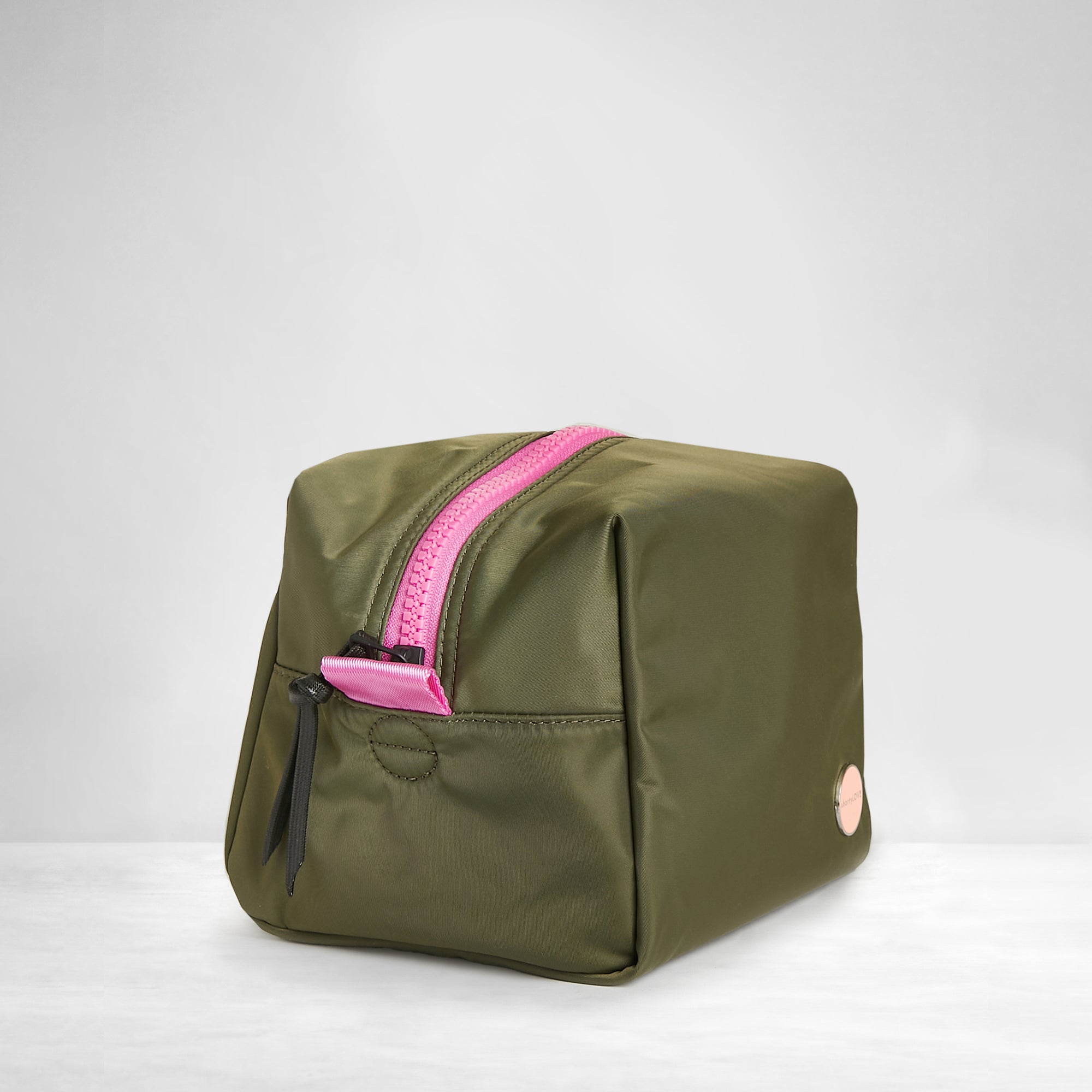 shortyLOVE stevie cosmetic bag in army green; side angle view against white background.