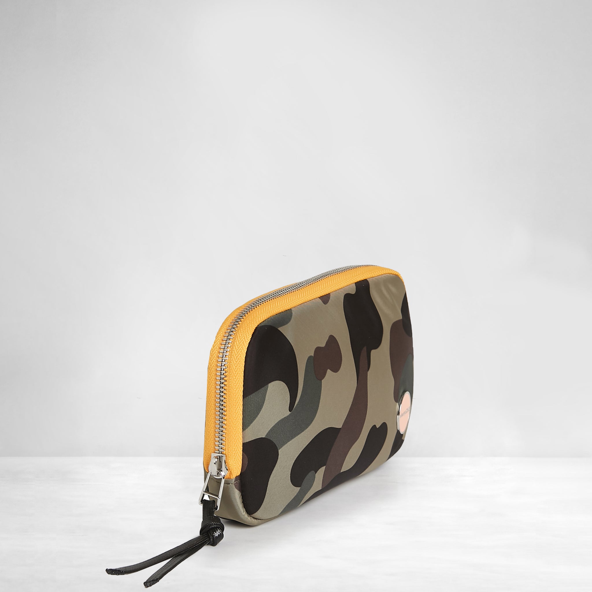 shortyLOVE jetty clutch/wallet in green camo; side angle view against white background.