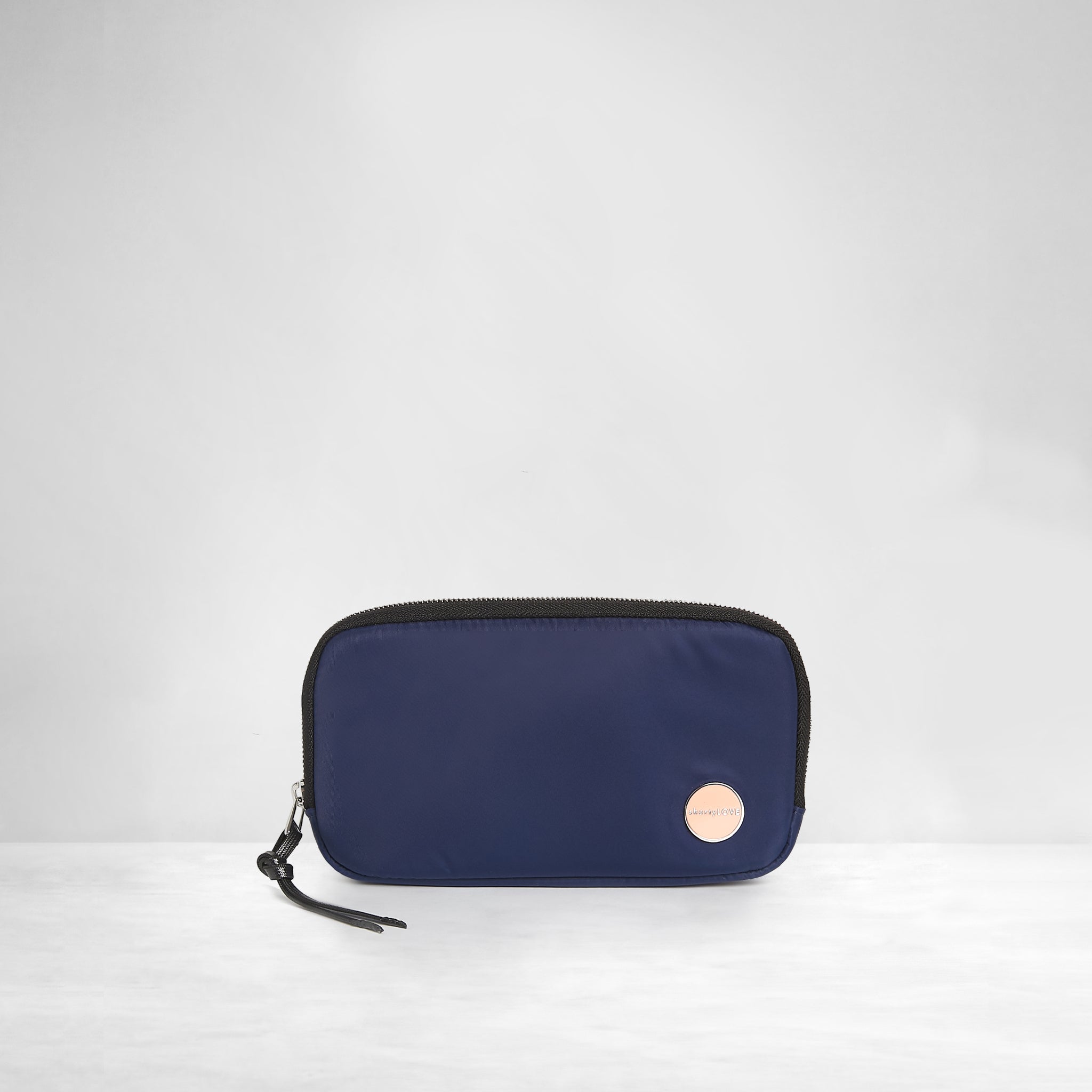 shortyLOVE jetty clutch/wallet in navy; front view against white background.