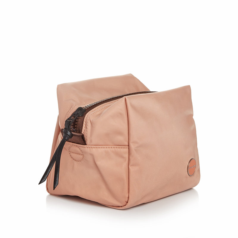 shortyLOVE stevie cosmetic bag in dusty peach; side angle view against white background.