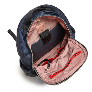 shortyLOVE tate backpack in midnight; top-down view showing interior blush lining against white background.