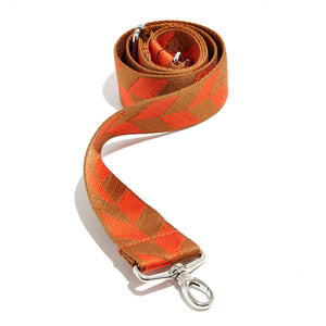 shortyLOVE boardwalk strap in arrow design orange/tobacco; front view rolled against white background.