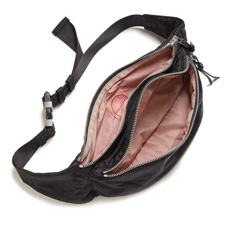 shortyLOVE arcade belt bag in black; top-down view showing interior pink lining against white background.