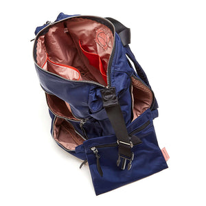 shortyLOVE boxer backpack bag in navy; top-down view showing interior pink lining against white background.