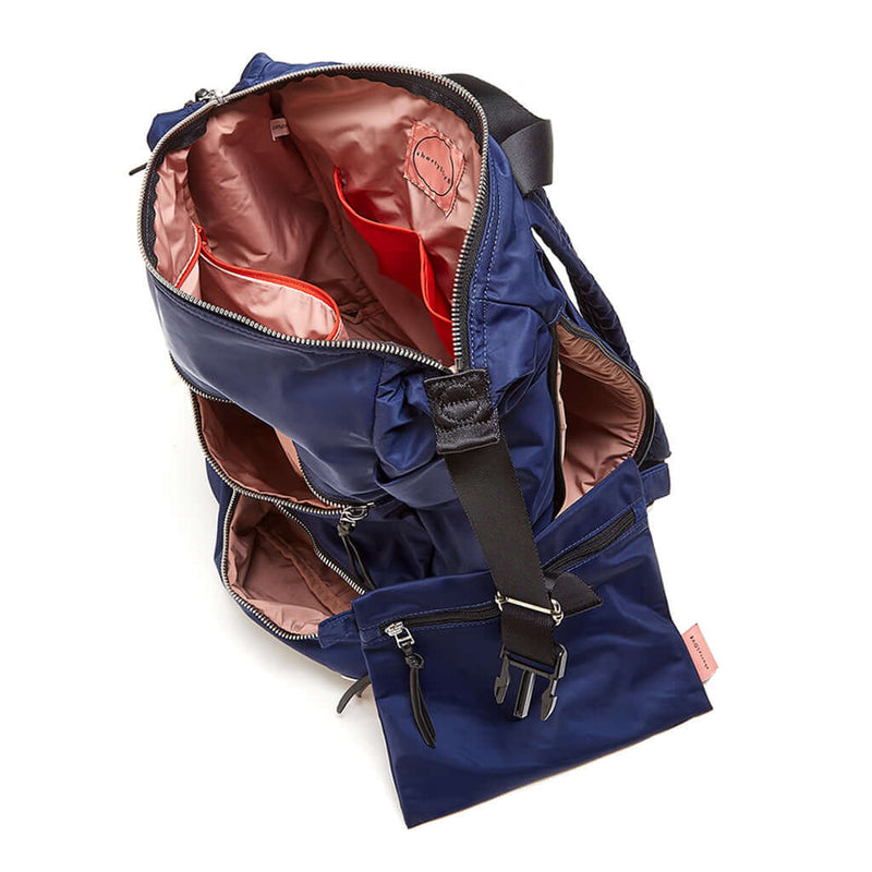 shortyLOVE boxer backpack bag in navy; top-down view showing interior pink lining against white background.