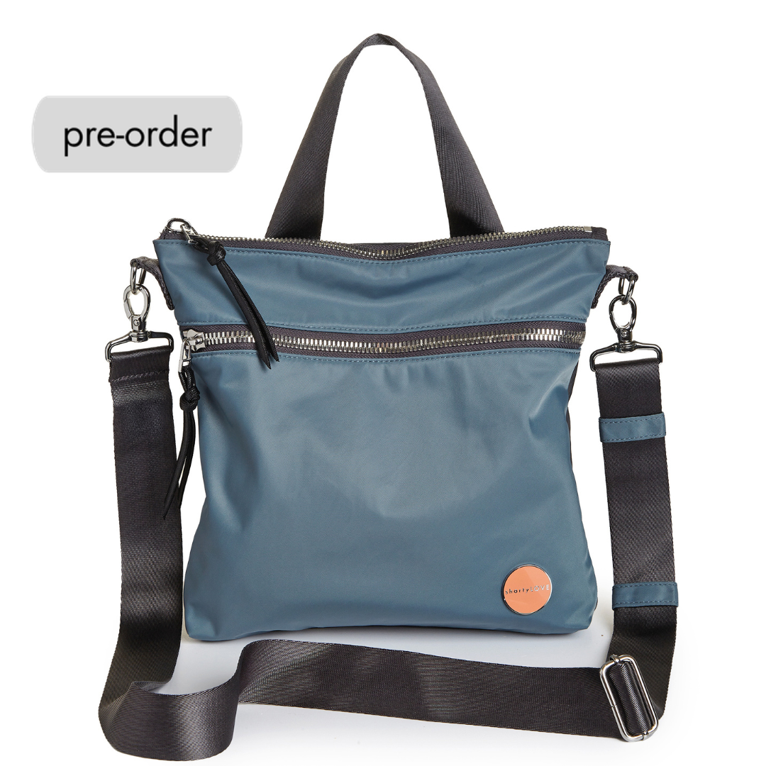 shortyLOVE amuse medium sized crossbody bag in steel blue/charcoal; front view against white background.