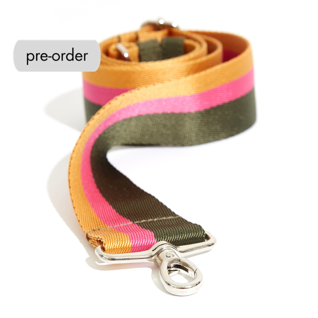 shortyLOVE boardwalk strap in green/yellow/fuchsia; front view rolled against white background.