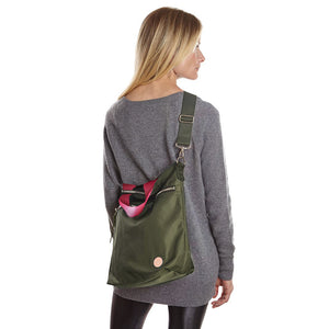 shortyLOVE wonder large crossbody/messenger bag in army green; on model in grey long sleeve sweater and black leggings against white background.