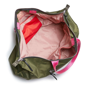 shortyLOVE friday weekender travel bag in army green; top-down view showing interior pink lining against white background.