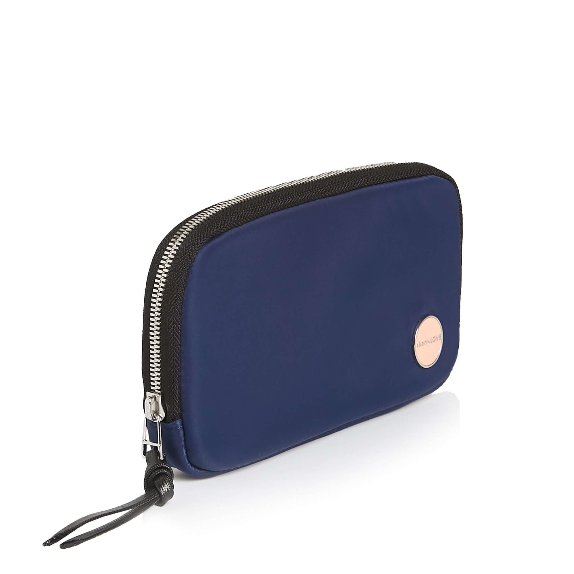 shortyLOVE jetty clutch/wallet in navy; side angle view against white background.