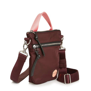 shortyLOVE shorthand small crossbody bag in burgundy; side angle view against white background.