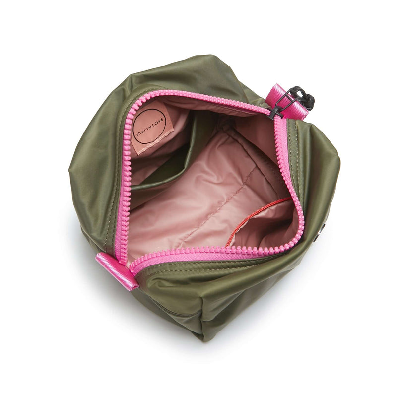 shortyLOVE stevie cosmetic bag in army green; top-down view showing interior pink lining against white background.