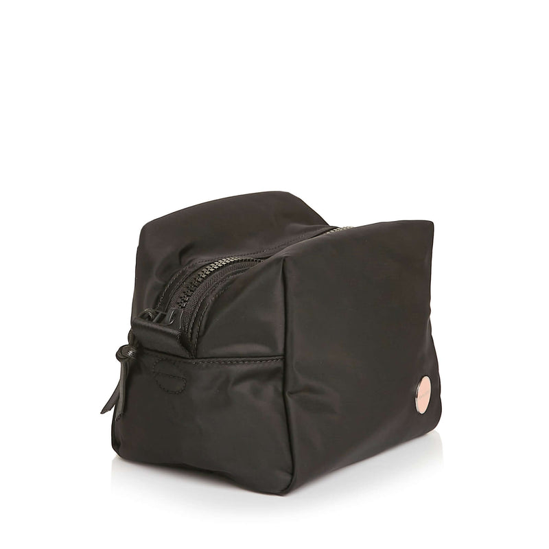 shortyLOVE stevie cosmetic bag in black; side angle view against white background.