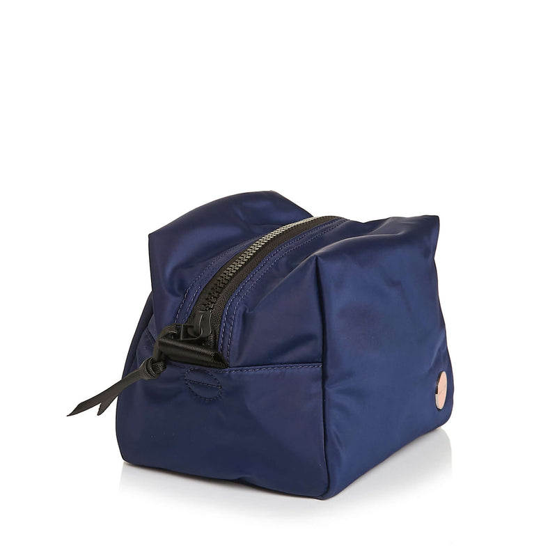 shortyLOVE stevie cosmetic bag in navy; side view against white background.