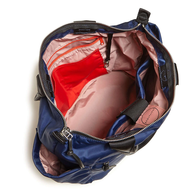 shortyLOVE tillie tote bag in navy; top-down view showing interior pink lining against white background.
