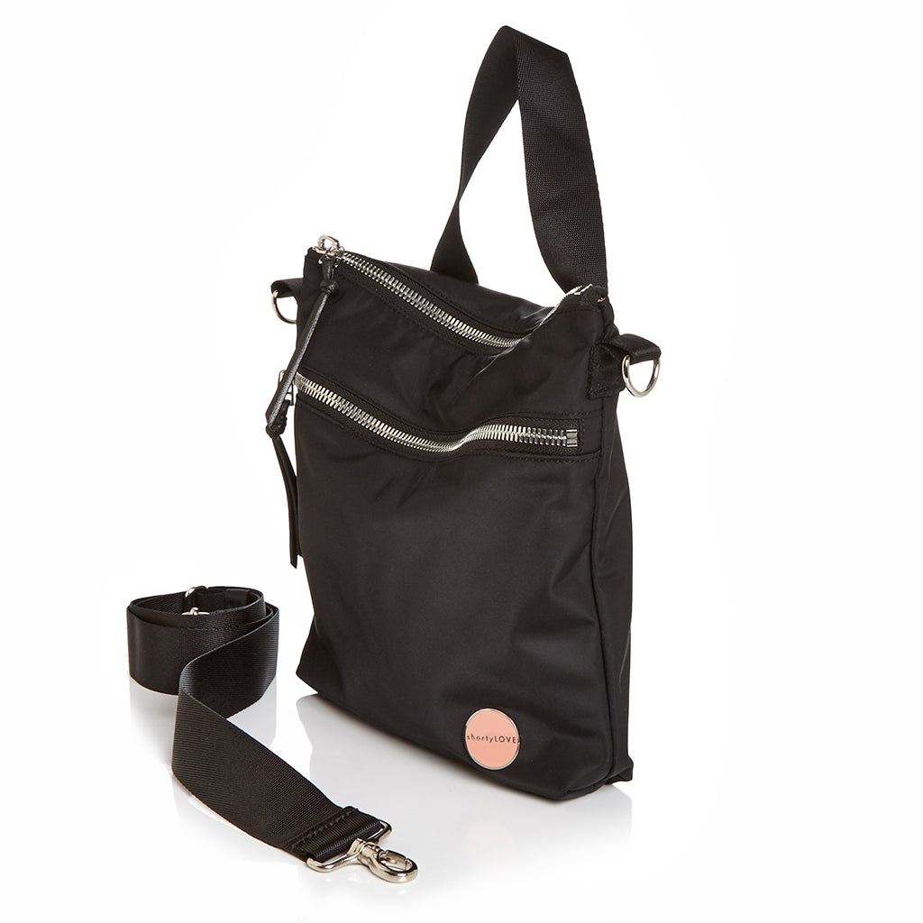 shortyLOVE amuse medium sized crossbody bag in black; side angle view against white background.