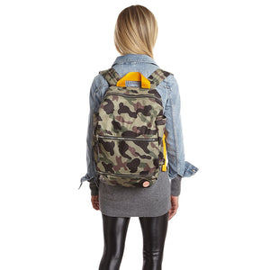 shortyLOVE boxer backpack bag in green camo; on model in blue jean jacket and black leggings against white background.